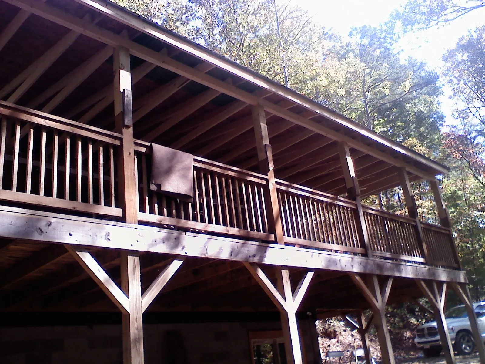 Timber framing under a new elevated porch and deck — Roof Leak Repair in Sunfield by Roofing Brothers